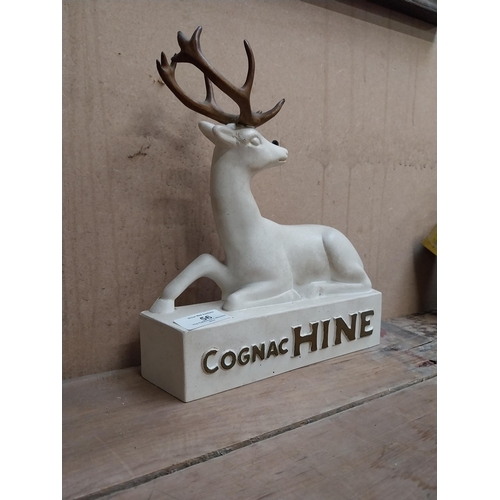 56 - Cognac Hine Ruberoid advertising figure. {25 cm H x 22 cm W x 6 cm D}.