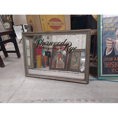 562 - Sherwood Rye The Finest Whiskey framed advertising mirror. {48 cm H x 68 cm W}.