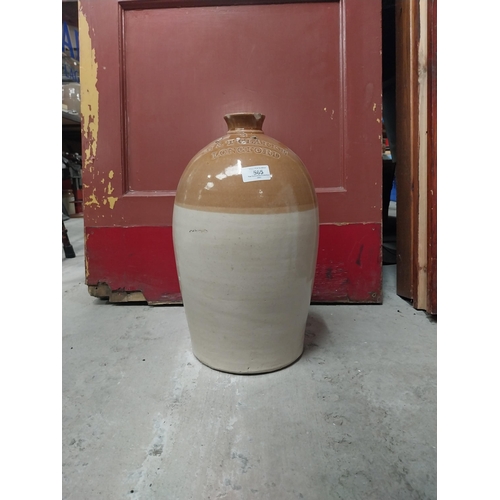 565 - M and T Clarke Longford two gallon stoneware flagon. {38 cm H x 20 cm Dia.}.