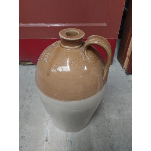 565 - M and T Clarke Longford two gallon stoneware flagon. {38 cm H x 20 cm Dia.}.