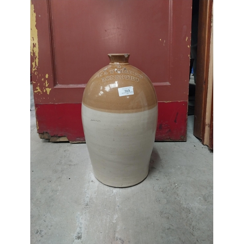 565 - M and T Clarke Longford two gallon stoneware flagon. {38 cm H x 20 cm Dia.}.