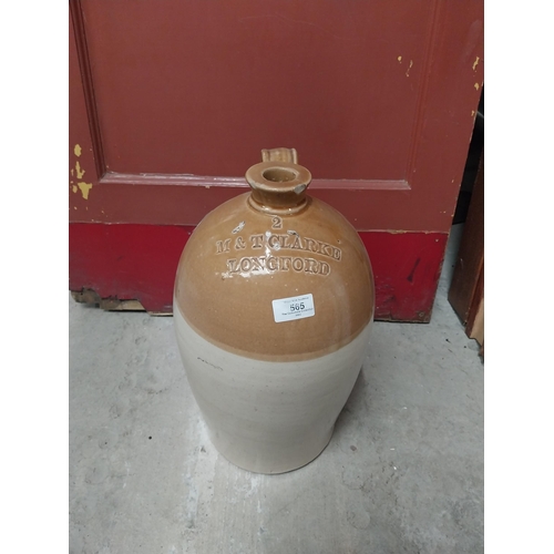 565 - M and T Clarke Longford two gallon stoneware flagon. {38 cm H x 20 cm Dia.}.