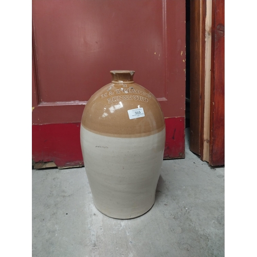 565 - M and T Clarke Longford two gallon stoneware flagon. {38 cm H x 20 cm Dia.}.