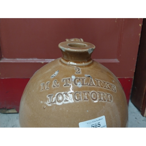 565 - M and T Clarke Longford two gallon stoneware flagon. {38 cm H x 20 cm Dia.}.