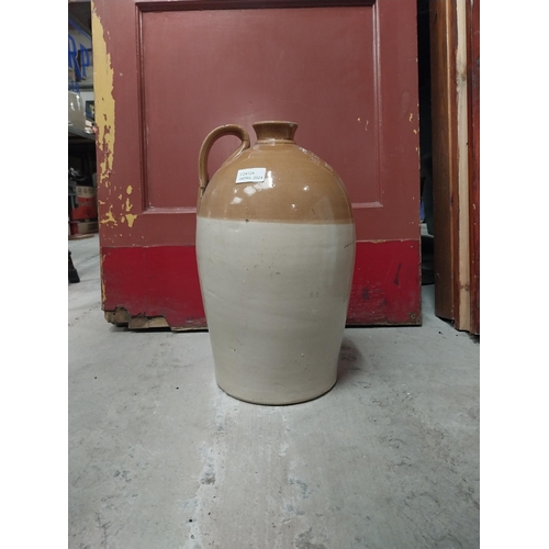 565 - M and T Clarke Longford two gallon stoneware flagon. {38 cm H x 20 cm Dia.}.