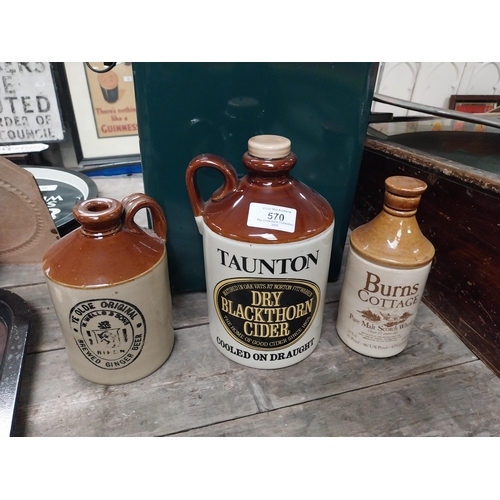 570 - Taunton Dry Blackthorn Cider and Ginger Beer bottle and Burns Cottage Whiksey flagon. {2o cm H x 12 ... 