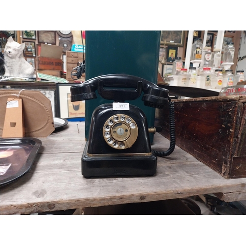 571 - 1940's bakelite wind up telephone. {25 cm H x 25 cm W x 14 cm D}.