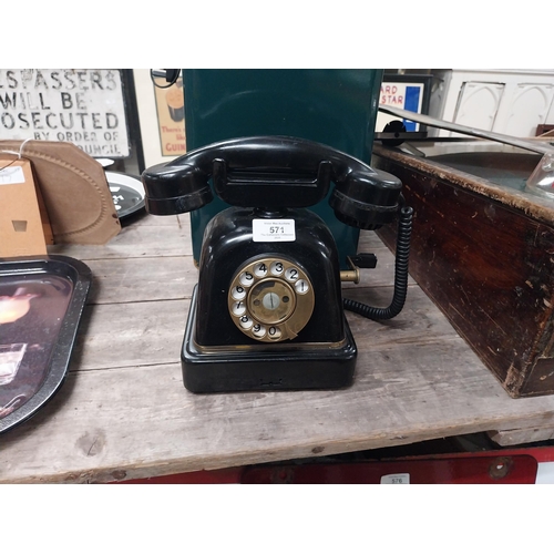 571 - 1940's bakelite wind up telephone. {25 cm H x 25 cm W x 14 cm D}.