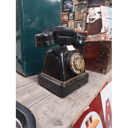 571 - 1940's bakelite wind up telephone. {25 cm H x 25 cm W x 14 cm D}.