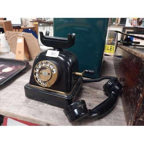 571 - 1940's bakelite wind up telephone. {25 cm H x 25 cm W x 14 cm D}.