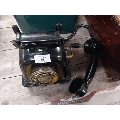 571 - 1940's bakelite wind up telephone. {25 cm H x 25 cm W x 14 cm D}.