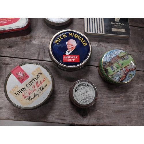 580 - Twelve tobacco tins - Mick McQuaid, Sweet Cut etc. {7 cm W x 10 cm W}.