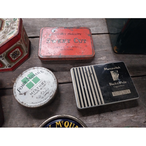 580 - Twelve tobacco tins - Mick McQuaid, Sweet Cut etc. {7 cm W x 10 cm W}.