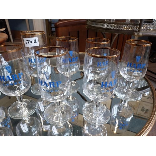 580B - Nine Harp Lager glasses. {17 cm H x 6 cm W}.