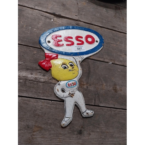 587 - Cast iron Esso Man advertising plaque. {28 cm H x 12 cm W}.