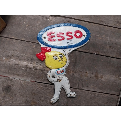 587 - Cast iron Esso Man advertising plaque. {28 cm H x 12 cm W}.