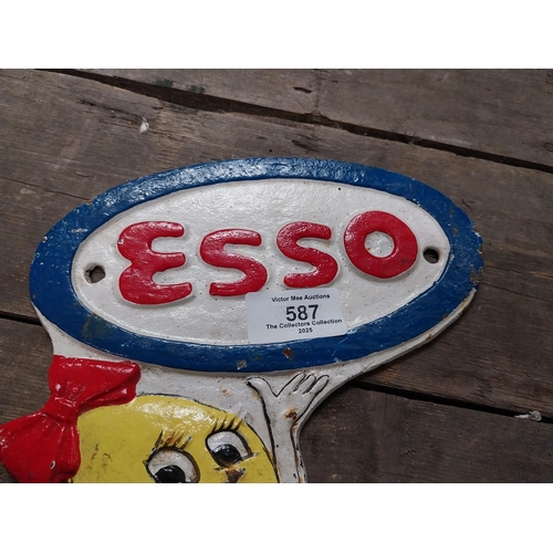 587 - Cast iron Esso Man advertising plaque. {28 cm H x 12 cm W}.