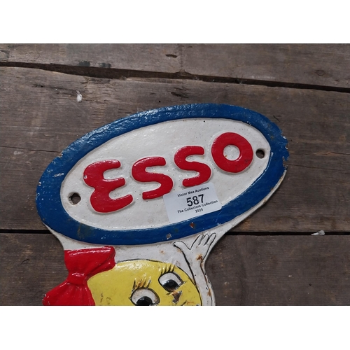 587 - Cast iron Esso Man advertising plaque. {28 cm H x 12 cm W}.