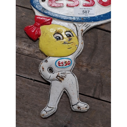 587 - Cast iron Esso Man advertising plaque. {28 cm H x 12 cm W}.