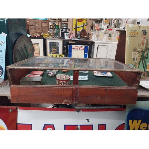 594 - Early 20th C. mahogany and glass counter display cabinet. {20 cm H x 92 cm W x 65 cm D}.