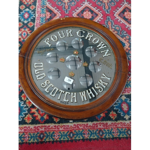 598 - Four Crown Old Scotch Whiskey Robert Brown and Co Ltd Glasgow framed advertising mirror. {50 cm Dia.... 