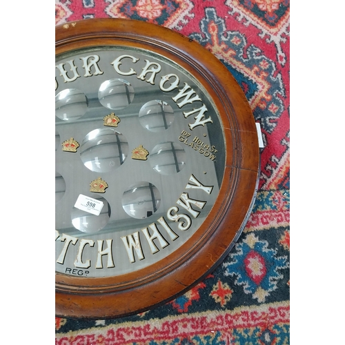 598 - Four Crown Old Scotch Whiskey Robert Brown and Co Ltd Glasgow framed advertising mirror. {50 cm Dia.... 