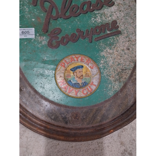 605 - Player's Please tinplate advertising sign. {45 cm H x 36 cm W}.