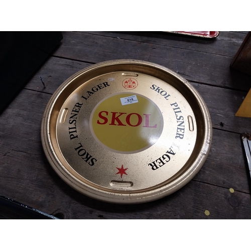 618 - Skol Lager tin plate drink's tray. {3 cm H x 34 cm Dia.}.