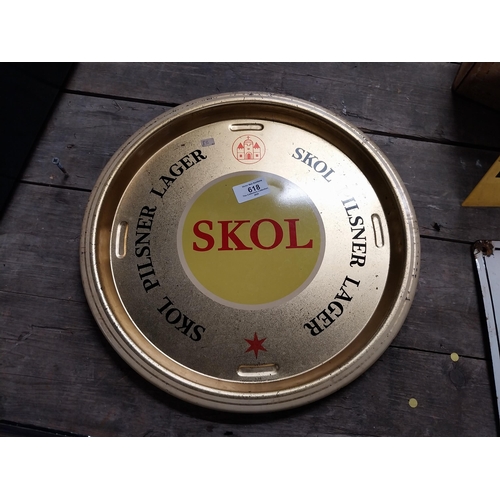 618 - Skol Lager tin plate drink's tray. {3 cm H x 34 cm Dia.}.