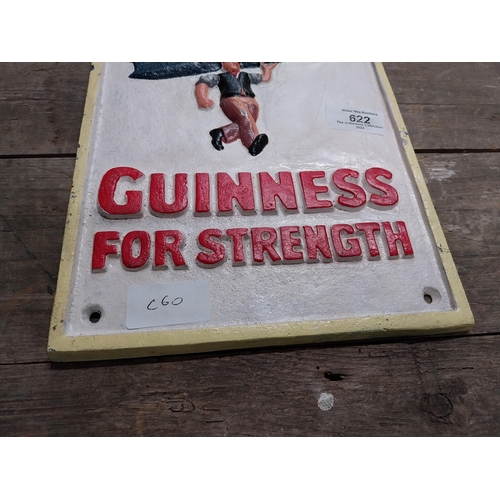 622 - Guinness For Strength cast iron advertising sign. {30 cm H x 20 cm W}.