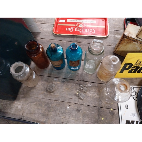 625 - 19th C. miscellaneous lot of seven blue, brown and clear chemist bottles. {23 cm H x 7 cm Dia to 14 ... 