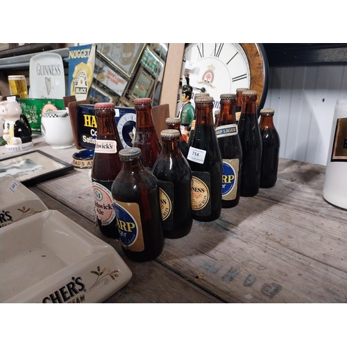 714 - Box of various Guinness, Smithwicks and Black Label glass bottles.