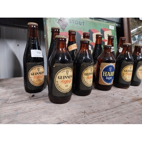 714 - Box of various Guinness, Smithwicks and Black Label glass bottles.