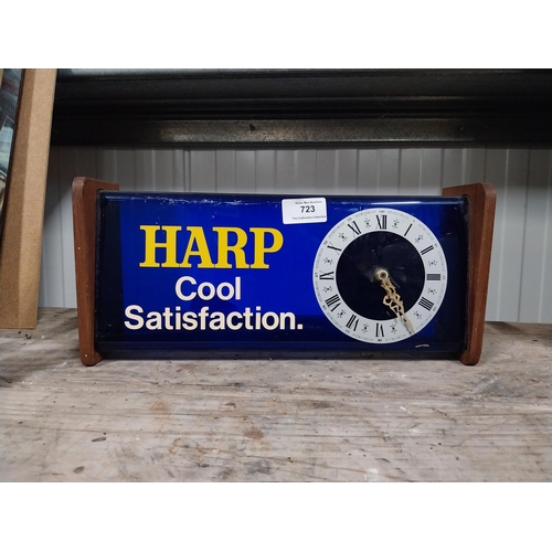 723 - 1970's Harp perspex and wood battery operated advertising clock. {15 cm H x 34 cm W x 9 cm D}