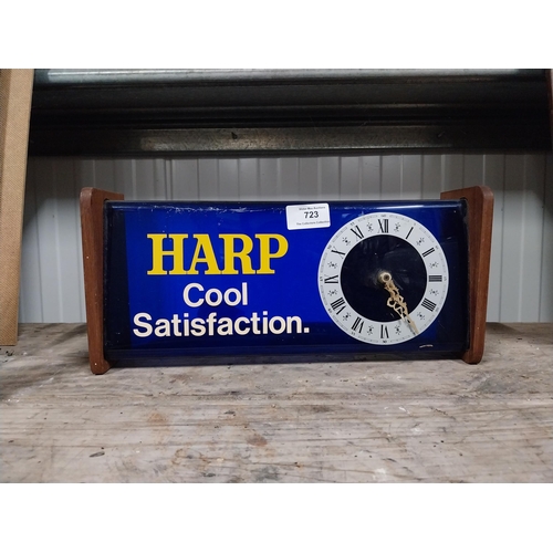 723 - 1970's Harp perspex and wood battery operated advertising clock. {15 cm H x 34 cm W x 9 cm D}