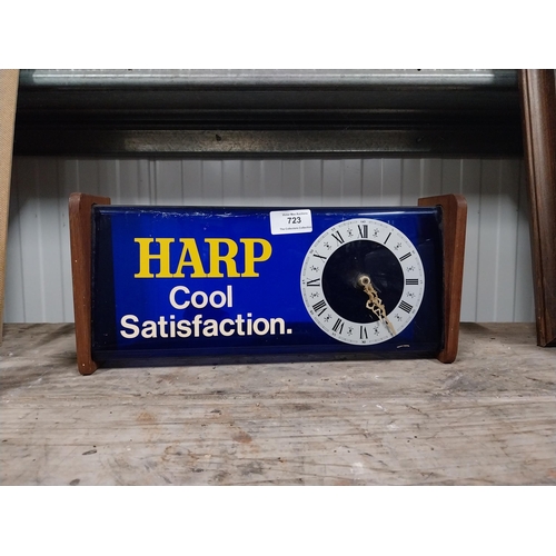 723 - 1970's Harp perspex and wood battery operated advertising clock. {15 cm H x 34 cm W x 9 cm D}