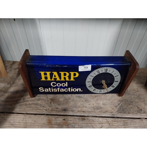 723 - 1970's Harp perspex and wood battery operated advertising clock. {15 cm H x 34 cm W x 9 cm D}