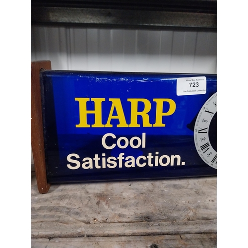 723 - 1970's Harp perspex and wood battery operated advertising clock. {15 cm H x 34 cm W x 9 cm D}