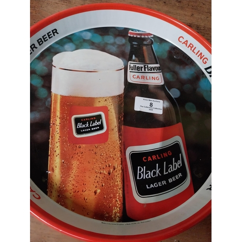 8 - Black Label tin plate advertising tray. {3 cm H x 30 cm Dia.}.