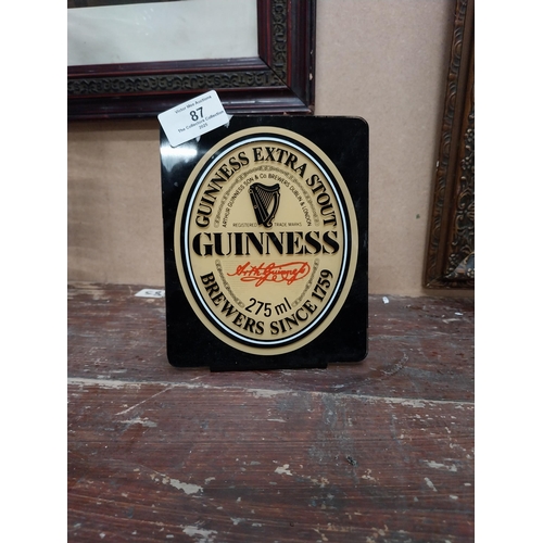 87 - Guinness perspex advertising shelf sign. {16 cm H x 13 cm W}