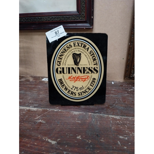 87 - Guinness perspex advertising shelf sign. {16 cm H x 13 cm W}