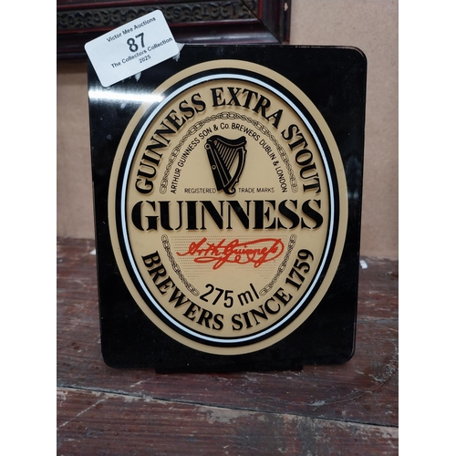 87 - Guinness perspex advertising shelf sign. {16 cm H x 13 cm W}