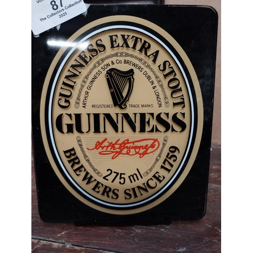 87 - Guinness perspex advertising shelf sign. {16 cm H x 13 cm W}