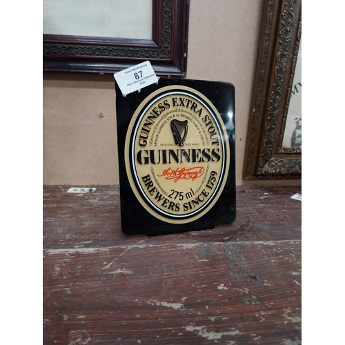 87 - Guinness perspex advertising shelf sign. {16 cm H x 13 cm W}