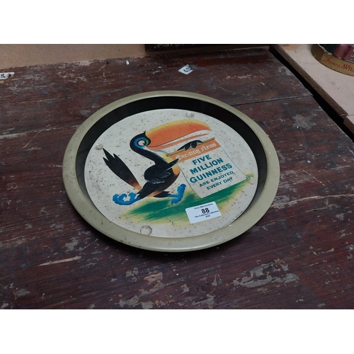 88 - Exciting times five million Guinness are enjoyed every day tin plate advertising tray. {3 cm H x 27 ... 