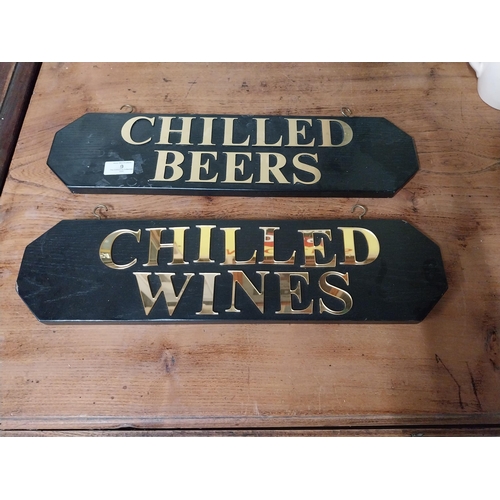 9 - Two wooden hanging signs � Chilled Beer and Chilled Wine. {13 cm H x 50 cm W}.