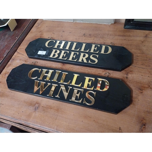 9 - Two wooden hanging signs � Chilled Beer and Chilled Wine. {13 cm H x 50 cm W}.