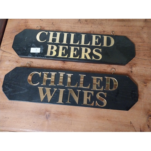 9 - Two wooden hanging signs � Chilled Beer and Chilled Wine. {13 cm H x 50 cm W}.