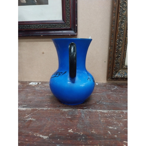 91 - Take a peg of John Begg ceramic advertising water jug {25 cm H x 13 cm Diam.}.