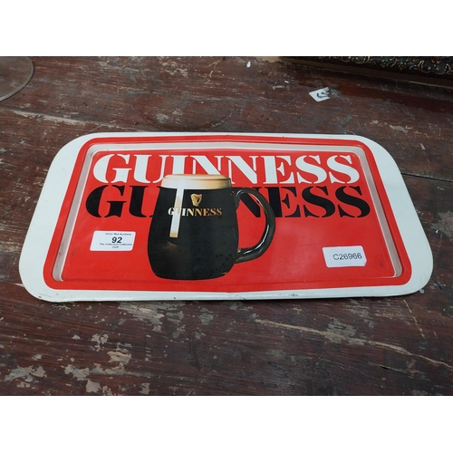 92 - Guinness tin plate drink�s tray. {20 cm H x 27 cm W}.